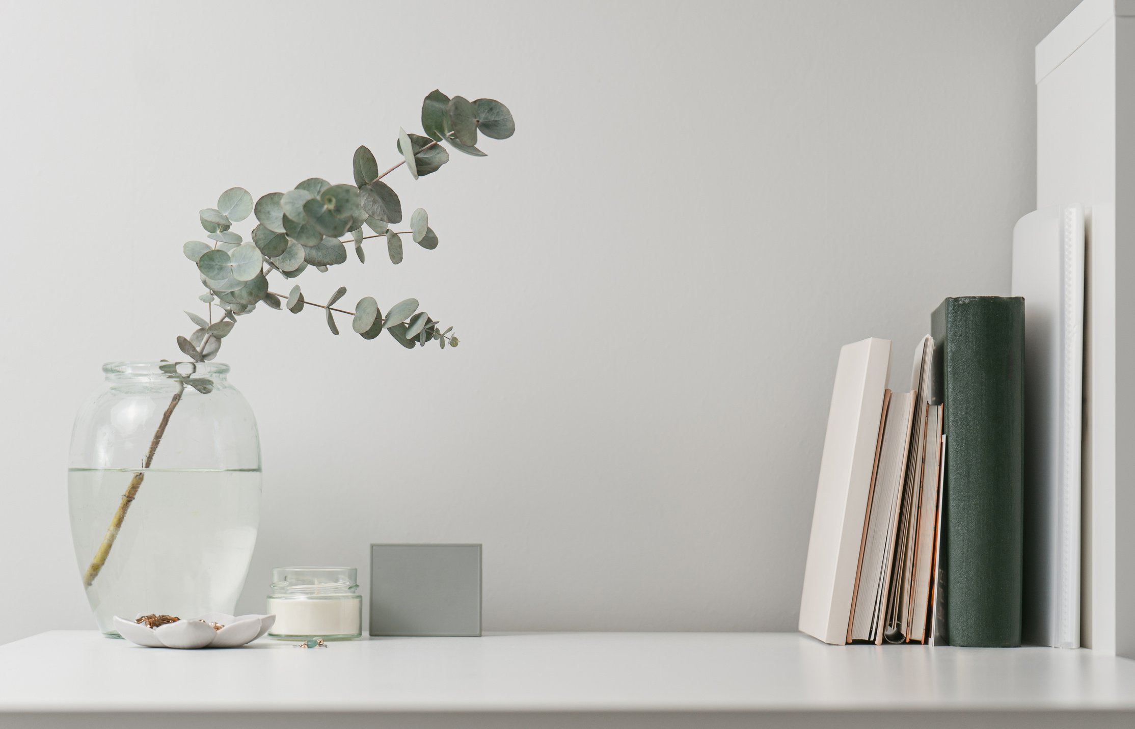 Minimal desk with books and notebooks, aesthetic home office